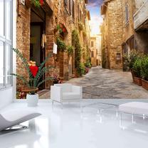 Fototapetas Artgeist Colourful Street In Tuscany MFT1137SAM, 105 cm x 147 cm