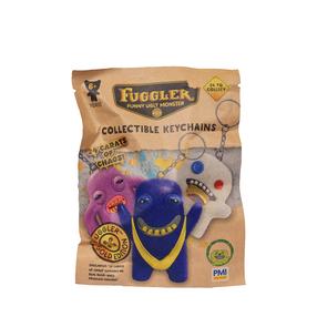 Atslēgu piekariņš Fuggler Collectible, (krāsa/dizains tiek izvēlēts nejauši)