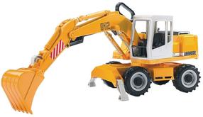  Mängutraktor Bruder 02426, 1:16, valge v./kollane v.