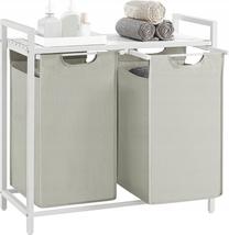 Vonios spintelė su skalbinių krepšiu Leobert, balta/pilka, 33 cm x 73 cm x 72 cm