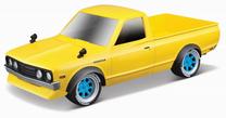 Игрушечная машина Maisto Design Datsun 620 Pick-up 1973, желтый цв.
