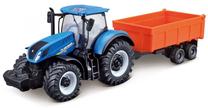 Игрушечный трактор Bburago New Holland T7.315 Farm Tractor With Tipping Trailer 18-31658, синий цв./черный цв./oранжевый цв.